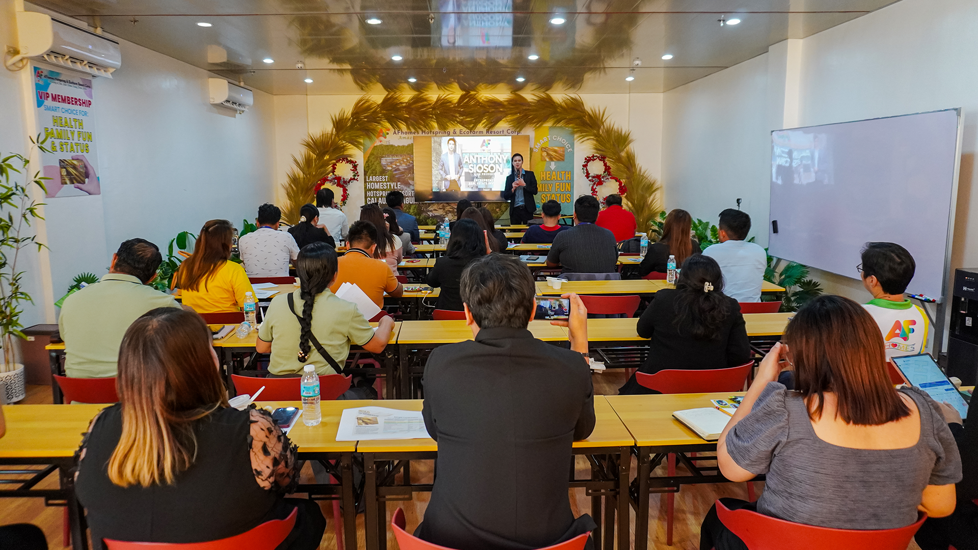 AFhomes Vice President Mark Anthony Sioson leads an engaging seminar, inspiring the team with strategies for success and excellence in the hospitality industry.